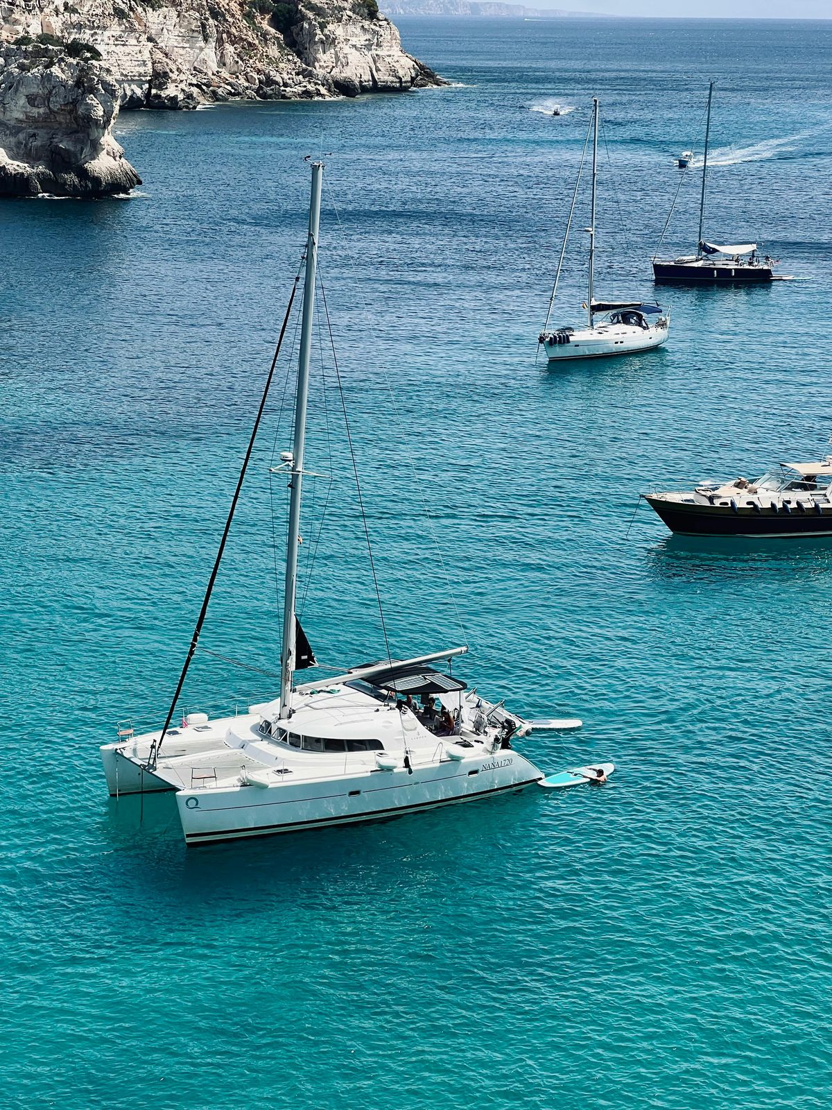 Catamaran anchored in crystal clear water on the Croatian Adriatic coast